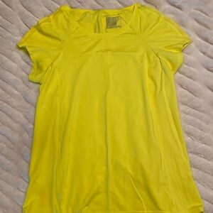 Lucky in love brand, neon yellow tie back athletic tee. Short sleeve mesh accent